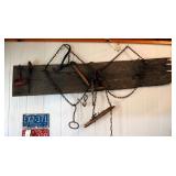 Primitive Tools Including, Hay Hooks, Ice Block Tongs, Fence Stretcher, And More Includes Wood Plank