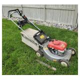 Honda Gas Powered Self Propelled Push Mower, Model HR215, With Electric Start And Clippings Bag