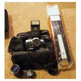 Olympus OM 10 35MM Camera With Additional Lenses, Filters, Tripod, Carry Case And More