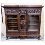 Antique Bookcase / Cabinet With High Relief Carved Wood, Beveled & Curved Glass, 9 Adjustable Shelve