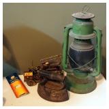 Vintage Shapleigh Hardware Oil Lantern, Copper Wind Up Musical Firetruck, And Sad Iron