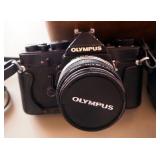 Vintage Olympus OM-1 35mm Camera, Including Additional Lenses, Flash, Manuals, And Leather Carrying 