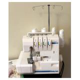 Baby Lock Surger, Model BL302, Includes Foot Pedal Controls, And Instruction Booklets