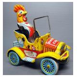 1957 Tin Happy Chick Friction Car (Missing Wing) And Tin Wind-Up Golfing Bear (May Need Repair)