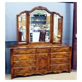 Ethan Allen Dresser, 9 Drawers, 3 Additional Drawers Hidden Behind Door, With Tri-Fold Mirror, 34" H