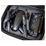 Four Axis Aerial Drones, Qty 3, With Instructions And Carry Cases