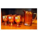 Marigold Carnival Glass Beverage Set, Including 8" Pitcher And 8 Stemmed Goblets