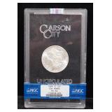 Carson City Mint 1884 Morgan Silver Dollar, Uncirculated, Certified By NGC, Graded MS64