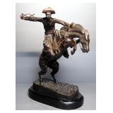Frederic Remington (American, 1861-1909) The Bronco Buster Bronze Statuette, 14" High