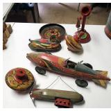 Antique Tin Litho Toys Including Wind Up Rocket Racer Wind Up Duck, Phone, Blimp And More