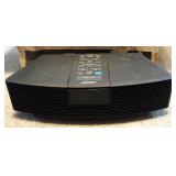 Bose Wave Radio, Bentley Head Phones, Battery Charger And AC Adaptor