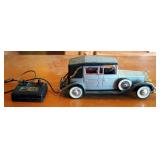 Die Cast Model T Ford Touring Car, Burago 1937 Jaguar SS100 Die Cast Model, And Remote Controlled Ja