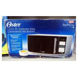 Oster 1.2 cu ft 1000 Watt Stainless Steel Countertop Microwave Oven And Oster Buffet Server/Warming 