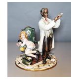 Capodimonte Porcelain Doctor With Child Sculpture, 11" x 8" x 6.5"