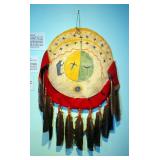 Southwest Plains Indian Hand Painted Buckskin Dance Shield With Red Trade Wool And Feathers, Circa 1