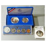 1986 Liberty Silver Dollar (.77 Toy oz Silver) And Half Dollar Set, 1966 Proof Set, And White Sands 
