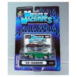 Muscle Machines Including 70 Olds 442, 57 Chevy, 69 Charger And 69 Boss 302