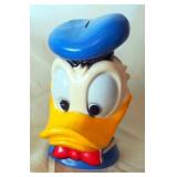 1970s Walt Disney Hard Rubber Donald Duck Coin Bank And 1960s Hard Rubber Posable Snoopy Peanuts Fig
