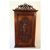 Antique Walnut Locking Wall Cabinet With Embossed Figural Panel And Carved Crossed Key Floral Crown,