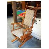 Antique Upholstered Spindle Rocker On Casters, 46" x 23.5" x 31"