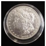 1879 And 1882 Morgan Silver Dollars