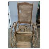 J S Ford Johnson And Company Antique Wheel Chair With Cane Seat And Back