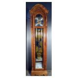 Howard Miller Grandfather Clock With Mirrored Back, Interior Light, And Glass Side Panels, Model 660