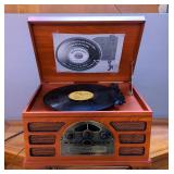 Crosley AM/FM Radio With CD, Tape Deck, And Turn Table, Model CR66, Powers On