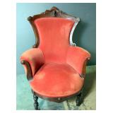 Upholstered Arm Chair With Dimensional Carved Man