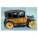 1920s Antique Yellow Cab Cast Iron Taxi Cab, With Driver, 4" H x 7.75" W x 3.25" D