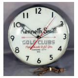 Kenneth Smith Golf Clubs Illuminated Electric Wall Clock, 14.75" Diameter, Clock Powers On