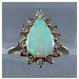 14k Gold Tear Drop Opal Ring Surrounded By 14 Multi-Faceted Round Cut Diamonds - Size 5