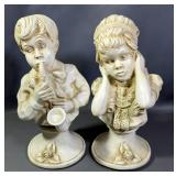 Universal Statuary Figurines Of Boy Playing Saxophone And Girl Covering Her Ears, Designed By J. Ken