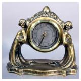 Deco Style Ladies Leaning Sarsaparilla Clock, Brass Deco Picture Frame, 3 Twisted Brass Candlestick 