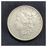 1885 & 1899-O US Morgan Silver Dollar Coins