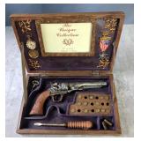 Painted Molded Resin Decorative Box Of Revolver, Bullets, Tools, Medal, And More 