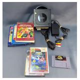 Nintendo Game Cube With Games Including Mario Power Tennis, Naruto Clash Of Ninja 2, SNES Jurassic P