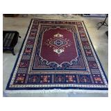 Polynaise Primitive Navy Blue Area Rug With Fringe, 94" x 136"