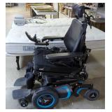 Permobil F5 Corpus Power Wheelchair Including ROHO High Profile Seat Cushion And High Efficiency Bat