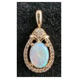 10K Yellow Gold Opal And .15 CTW Diamond Pendant