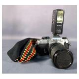 Nikon FG 35mm Film Camera with Tokina Lens and Argus Flash Nikon FG 35mm Film Camera with Tokina Lens and Argus Flash