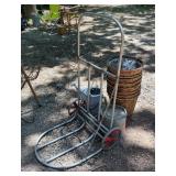 Rolling Utility Cart with Watering Can, Woven Flower Pots, And More Rolling Utility Cart with Watering Can, Woven Flower Pots, And More