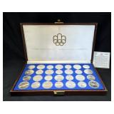 1976 Uncirculated Canadian Olympic Coin Set in Display Box, Series I Through VII 