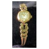 Gold-Tone Ladies Bulova Wrist Watch with Decorative Band 