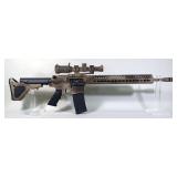 Bushmaster XM15-E2S .223-5.56mm Rifle SN# L462730, Nikon 1-4x20 Scope, Adjustable Stock, In Soft Cas