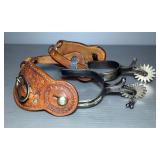 Spurs With Tooled Leather Spur Straps, Qty 2, Swing Arm Is Marked Colorado, Heelband Has Arrow Decor