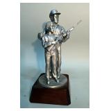 Pewter Statuette Of Father And Son Shooting, And Firearms Books