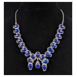 Polished Lapis Lazuli Squash Blossom Cabochon Necklace, 22 Stones
