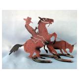 Metal Cowboy And Steer Sculpture On Horseshoe Base