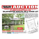 Dilapidated Duplex on a Level Lot in Town
